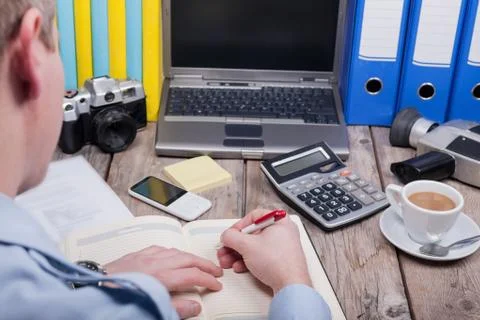 Worktable of young businessman Stock Photos
