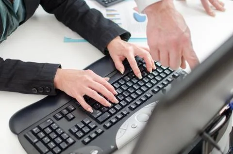 Workteam working on a computer 스톡 사진