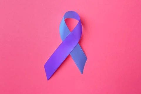 World Arthritis Day. Blue and purple awareness ribbon on pink background, t.. Stock Photos