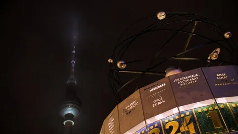 The world clock and television tower in the night gog Video stock 125818316