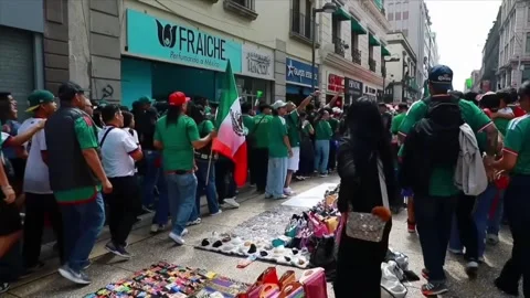 The World Cup overflows Mexico City's Zócalo and spills into the streets of the  Stock Footage 337550762