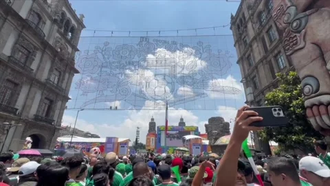 World Cup overflows Mexico City's Zócalo and spills into the streets of the Hist Stock Footage 337551472