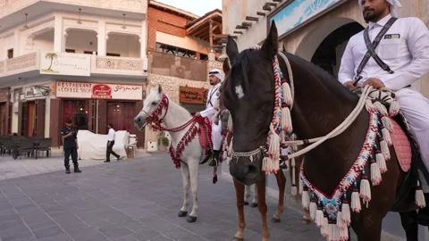 World Cup Qatar 2022 security horses police in Souk Waqif, Doha 库存影片 222909517