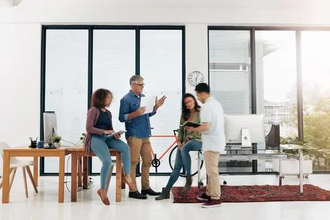The world of design is fast-paced. Full length shot of four creative Stock Photos