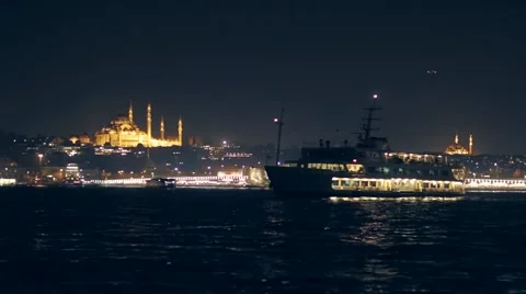 World Famous Bosphorus Ferry and The Mosques at night in Istanbul Turkey Stock Footage 61124306