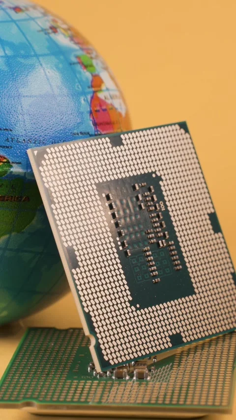 World globe and microprocessors against an orange background Видео 277847921