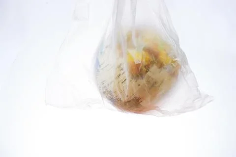 World globe in plastic bag isolated on white background Stock Photos