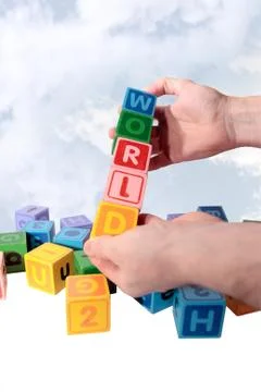 World in hands with clouds Stock Photos