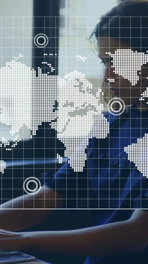 World map animation over person working on laptop in office environment Vídeo Stock 344244802