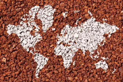 World map on the background of ground coffee as an export concept. Foto stock