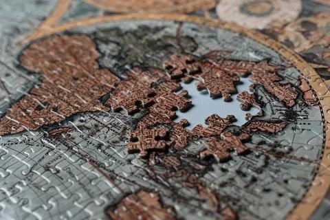 World map of broken puzzle centered on China Stock Photos