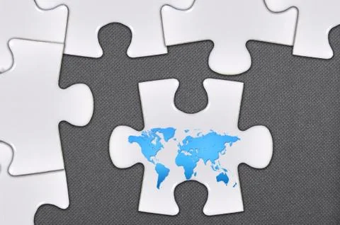 World map on close up puzzle Foto stock
