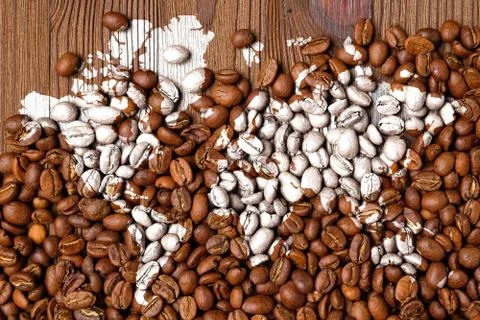World map on coffee beans as a world export concept. Stock Photos