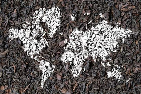 World map on dry tea as a concept of export around the world. Stock Photos