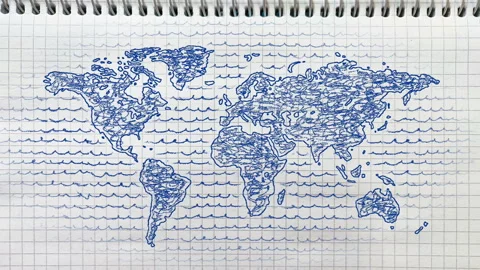 World map on a notebook sheet in a cell | Stock Video | Pond5