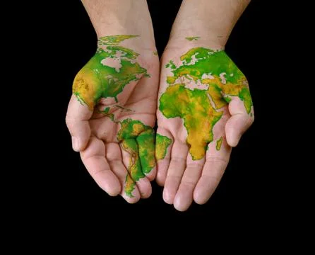 World map painted on hands. Stock Photos