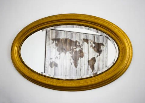 World map reflecting in oval mirror, Krakow, Lesser Poland, Poland Stock-Fotos