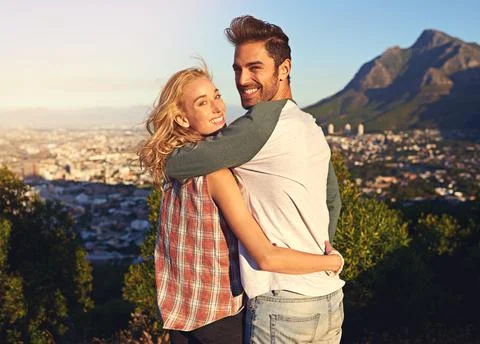 The world is ours to explore. Portrait of an affectionate young couple outdoo Fotos Stock