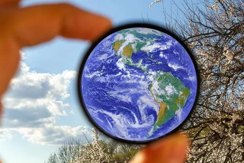 World planet in hand. Concern for the environment and ecology. Elements of th Stockfoto's