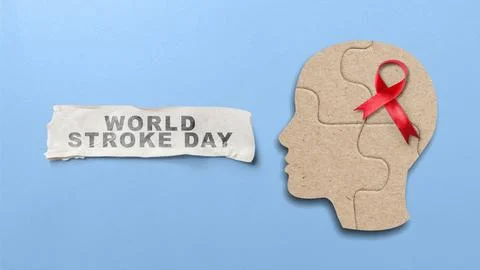 World Stroke Day concept image featuring a text banner and cardboard jigsaw.. Stock Photos