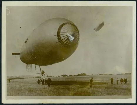 World War 1 - Two small zeppelines and field crew landing place Stock Photos