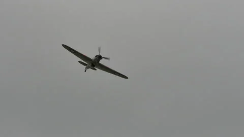 World War 2 Battle of England British propeller fighter plane in flight Stock Footage 155850247