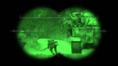 World War 2 battlefield re-enactment viewed through night vision binoculars 動画素材 57336255