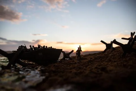World War 2 reenactment (D-day). Creative decoration with toy soldiers, landi Stock Photos