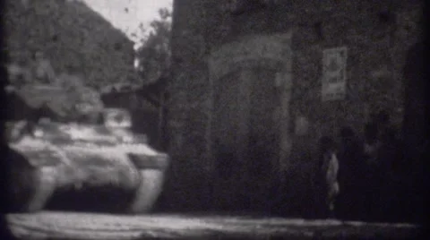 World War 2 - Tank driving through occupied city 動画素材 41277166