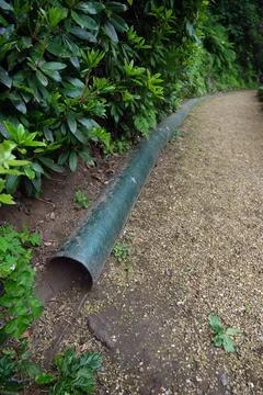World War II PLUTO Pipeline Section beside a Path Stock Photos