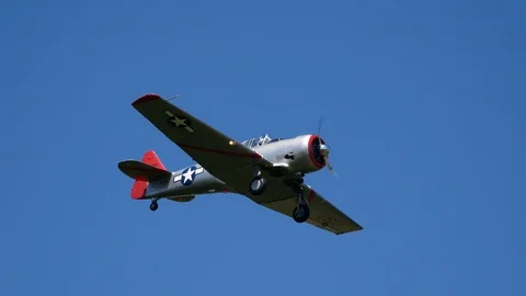 World War II SNJ T-6 Flies Overhead and Lands Stock Footage 114439543