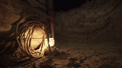 World war one soldier runs through dark trenches at night, navigating the Stockbeeldmateriaal 295835685