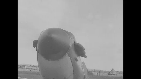 World War Two British fighter planes take off, fly in formation Stock Footage 103376276