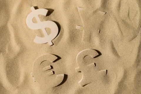 World Wealth Under the Sand Stock Photos