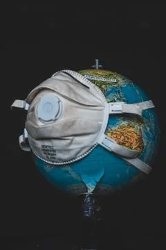 The world wears a mask to protect itself from infection of CORONAVIRUS. Stockfoto's