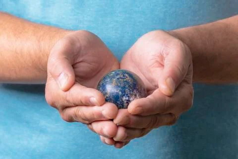 The world is in your hands. Stock Photos