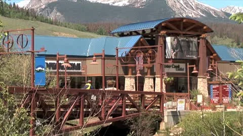 WorldClips-Dillon Outlet Stores Cyclist-ws-zoom Stock-Footage 8922823
