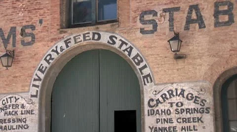 WorldClips-Old Livery-Feed Stable Building-zoom Video stock 8923441