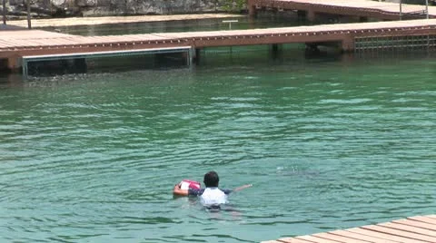 WorldClips-Xel-Ha Dolphin-Trainer Stock Footage 8921797