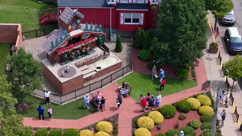 World’s largest outdoor cuckoo clock attraction in Sugarcreek Ohio with visitors Video stock 316746811