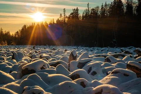 The world's largest stone river in the snow in the rays of the setting sun Stock Photos