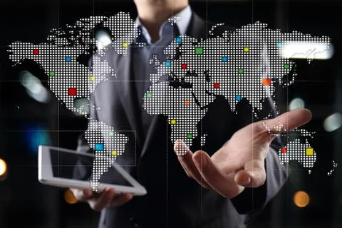 Worlds maps on virtual screen. Business, internet and technology concept. 库存照片