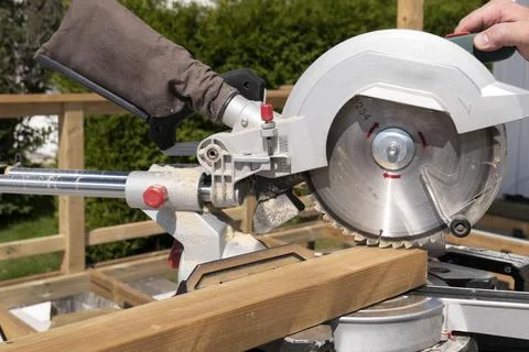 Worm drive circular saw to cut boards Stock Photos