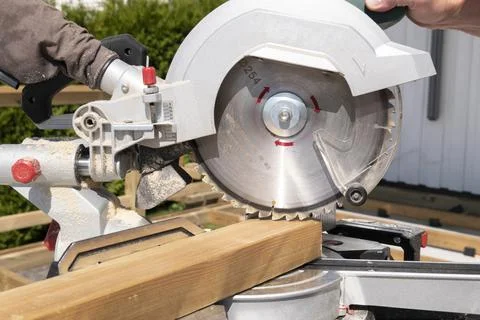 Worm drive circular saw to cut boards Stock Photos