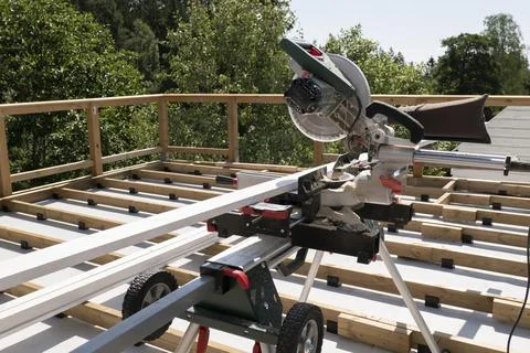 Worm drive circular saw to cut boards Stock Photos