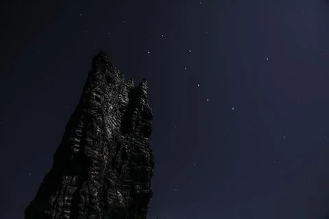 Worm's eye view of black rock. Stock Photos