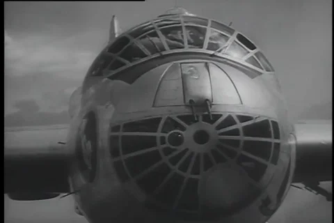 Worm's eye view of the Interior of B-36 bomber plane at airbase - 1956 Stock Footage 99085814