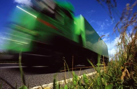 Worms eye view of lorry travelling along country road leeds yorkshire uk Stock Photos