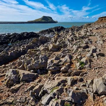 Worm's Head is a tidal island located on the Gower Peninsula in South Wales.. Foto stock