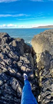 Worm's Head is a tidal island located on the Gower Peninsula in South Wales.. Stock Photos